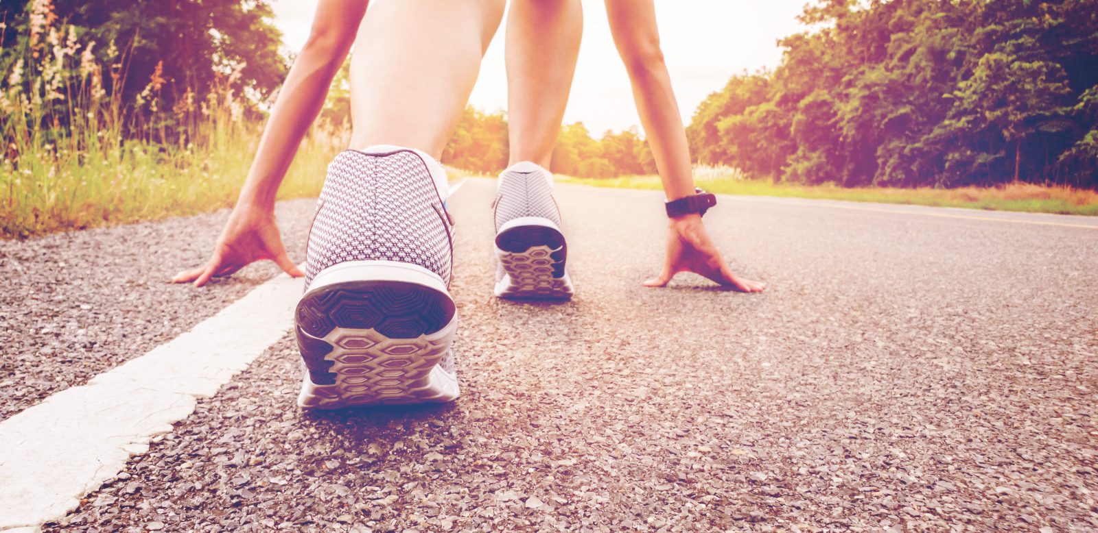 Start of people running on street,with sunset light.Goal of Success